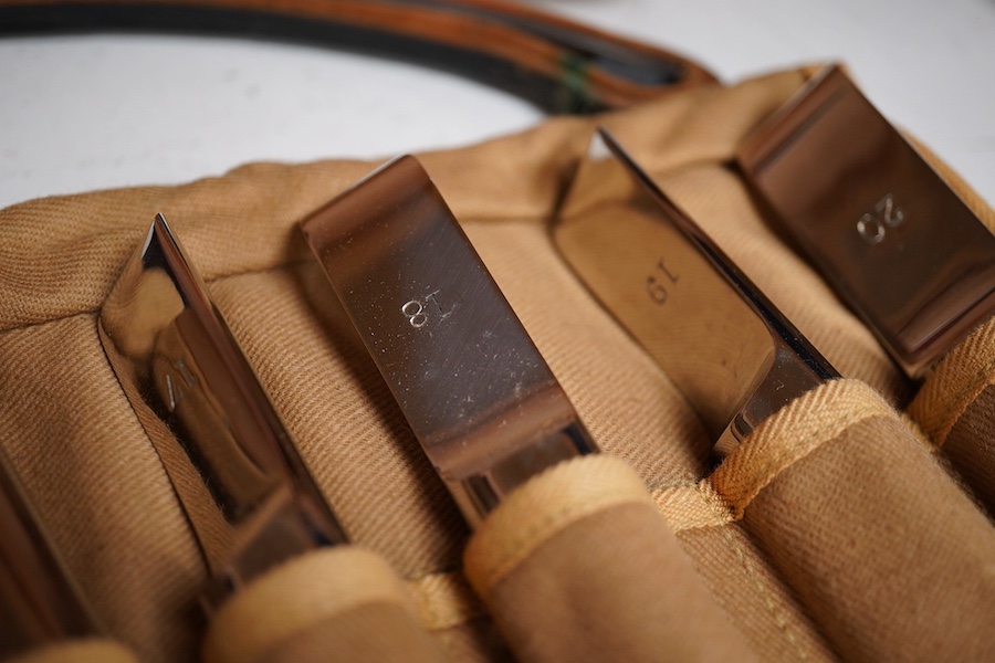 A late 19th century leather cased medical set of catheter surgical instruments, together with a single leather case catheter, plus an early 20th century canvas roll containing a graduated set of gynaecological surgical i